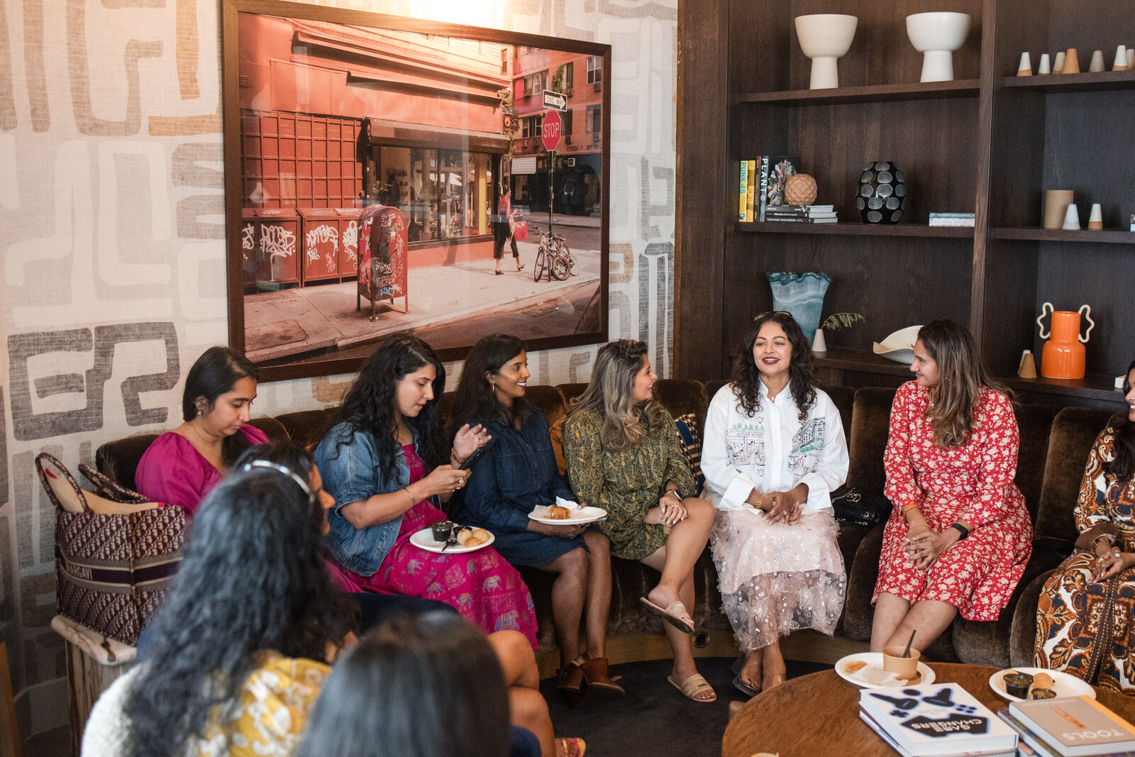 A speaker mid-sentence at a Brown Girls Money Moves learning session in Austin