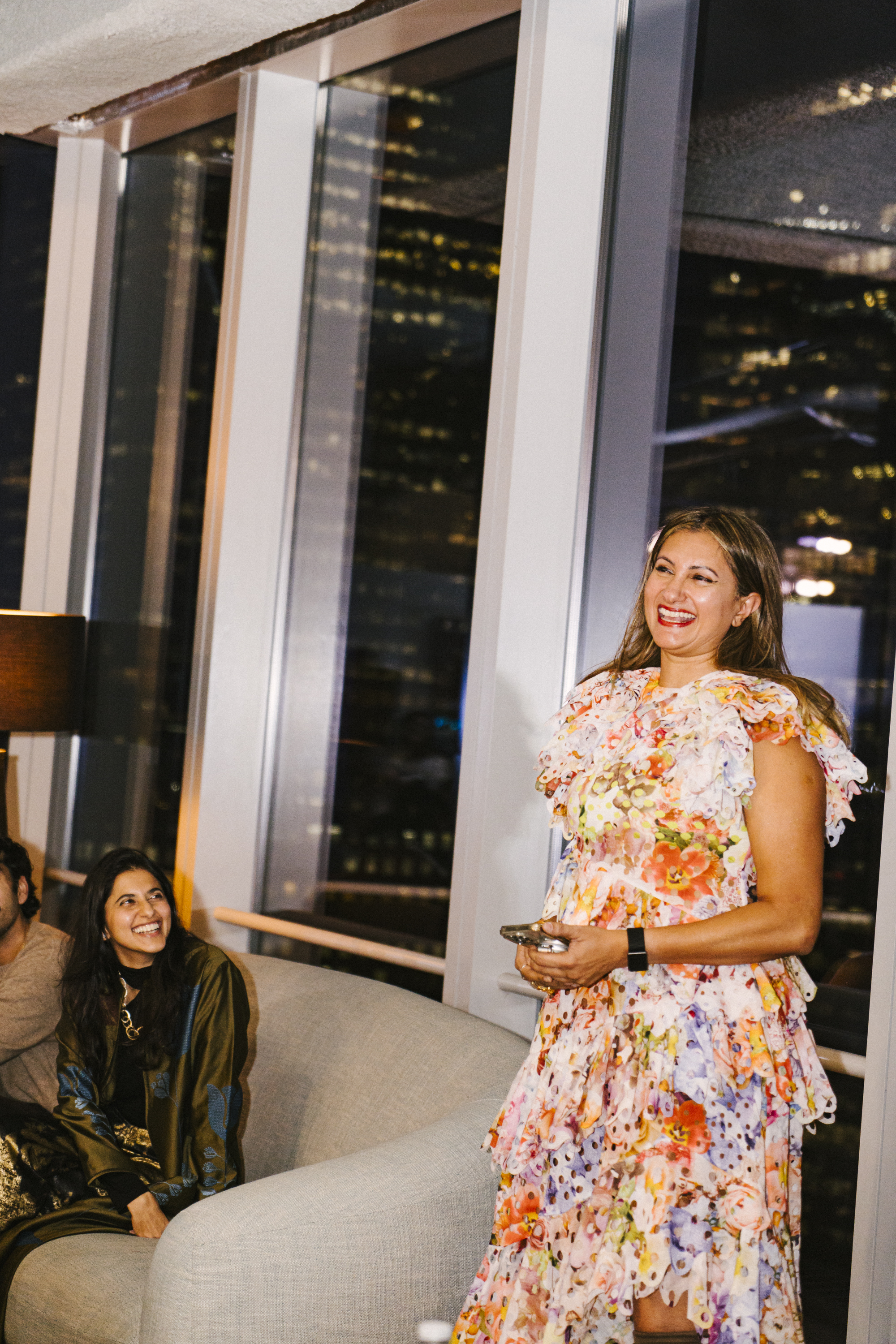Bhargavi Varma laughing at the Brown Girl Angels SickKids fundraiser in New York — a candid moment from the room she built.