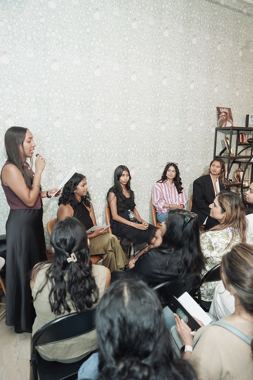 A founder pitching at Brown Girl Angels Pitch the Collective