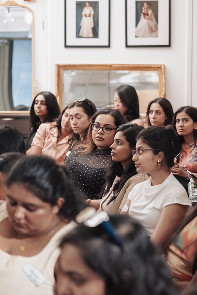An engaged audience at a Brown Girl Angels learning event